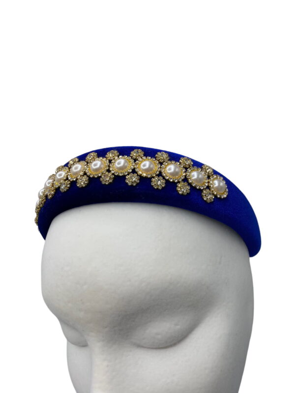 Cobalt blue padded millinery made headband with embellished detail.
